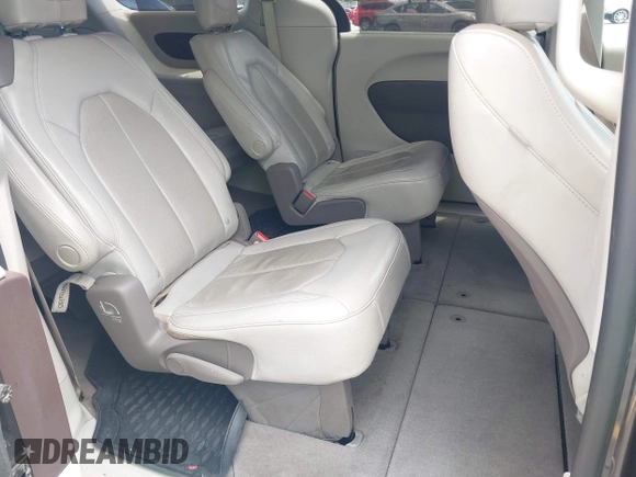 2020 Chrysler Pacifica Touring L with VIN 2C4RC1BG1LR269004, listed as a IAAI auction lot 42287228 with 71,498 mi miles and . Bid and sale history available at DreamBid. Image 8.