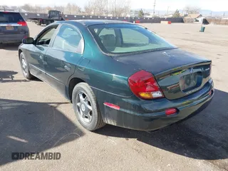 2001 Oldsmobile Aurora z VIN 1G3GS64C114169938, wystawiony jako IAAI lot #41578800 z przebiegiem 160 075 mil mil oraz . Historia ofert i sprzedaży dostępna na DreamBid. Obrazek 3.
