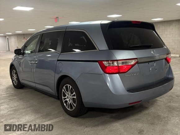2011 Honda Odyssey EX-L with VIN 5FNRL5H64BB042793, listed as a Copart auction lot 56841615 with 149,454 mi miles and Clean Title. Bid and sale history available at DreamBid. Image 3.