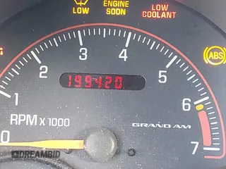 2005 Pontiac Grand Am GT with VIN 1G2NW12E65M156857, listed as a IAAI auction lot 41548935 with 199,420 mi miles. Bid and sale history available at carsss.com. Image 16.