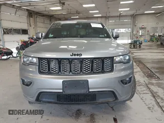 2018 Jeep Grand Cherokee Laredo E with VIN 1C4RJFAG7JC203793, listed as a IAAI auction lot 42585072 with 263,987 mi miles and . Bid and sale history available at DreamBid. Image 12.