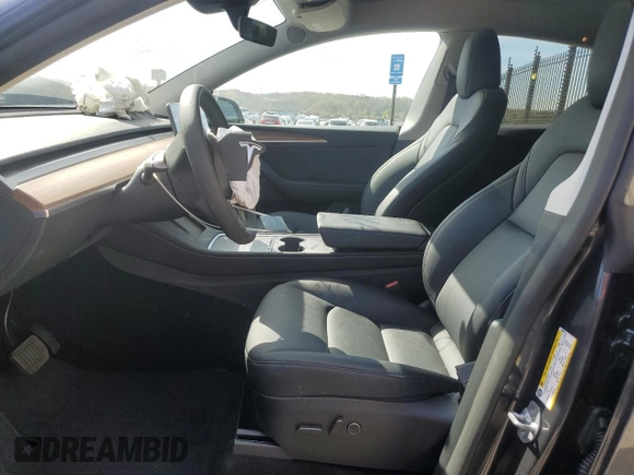 2025 Tesla Model Y Long Range with VIN 7SAYGAEEXSF253326, listed as a Copart auction lot 49527965 with 5,803 mi miles and Salvage Title. Bid and sale history available at DreamBid. Image 7.