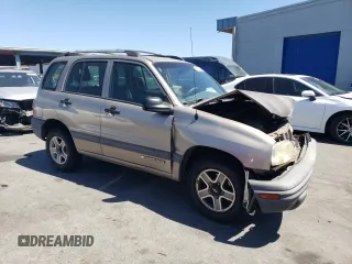 2002 Chevrolet Tracker z VIN 2CNBJ13C026951435, wystawiony jako Copart lot #57782784 z przebiegiem 132 279 mil mil oraz Szkody całkowita. Historia ofert i sprzedaży dostępna na DreamBid. Obrazek 4.
