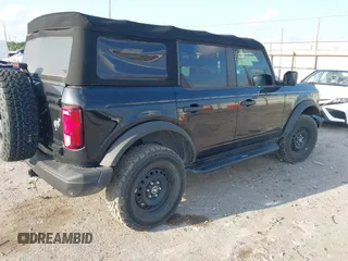 2022 Ford Bronco z VIN 1FMEE5BP3NLA74562, wystawiony jako IAAI lot #42338666 z przebiegiem 20 743 mil mil oraz . Historia ofert i sprzedaży dostępna na DreamBid. Obrazek 4.