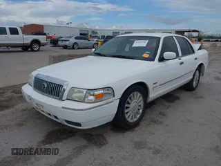 2009 Mercury Grand Marquis LS with VIN 2MEHM75V09X622177, listed as a IAAI auction lot 41899568 with 145,826 mi miles. Bid and sale history available at carsss.com. Image 2.