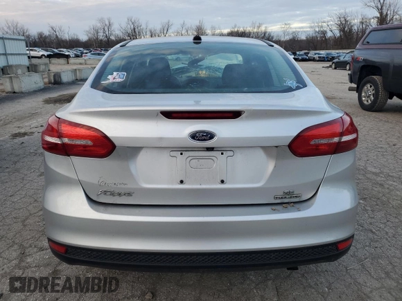 2015 Ford Focus SE with VIN 1FADP3F2XFL306322, listed as a Copart auction lot 41367765 with 58,901 mi miles and Salvage Title. Bid and sale history available at DreamBid. Image 6.