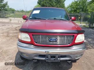 2002 Ford F-150 XL with VIN 1FTRX18L42NA99340, listed as a IAAI auction lot 42641912 with 98,195 mi miles and . Bid and sale history available at DreamBid. Image 6.