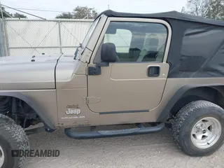 2003 Jeep Wrangler SE with VIN 1J4FA29113P304250, listed as a IAAI auction lot 40917099 with 191,589 mi miles. Bid and sale history available at carsss.com. Image 14.