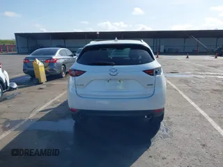 2017 Mazda CX-5 Grand Touring with VIN JM3KFADLXH0222341, listed as a IAAI auction lot 41990464 with 94,374 mi miles and . Bid and sale history available at carsss.com. Image 17.