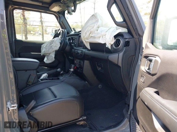 2022 Jeep Wrangler Unlimited Sahara with VIN 1C4HJXEM7NW206585, listed as a IAAI auction lot 42102516 with 10,769 mi miles and . Bid and sale history available at DreamBid. Image 5.