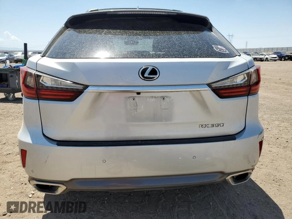2016 Lexus RX 350 with VIN 2T2ZZMCA8GC016032, listed as a Copart auction lot 58400605 with 142,878 mi miles and Salvage title. Bid and sale history available at DreamBid. Image 6.