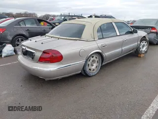 2001 Lincoln Continental with VIN 1LNHM97VX1Y627039, listed as a IAAI auction lot 41482016 with 143,317 mi miles and . Bid and sale history available at DreamBid. Image 4.