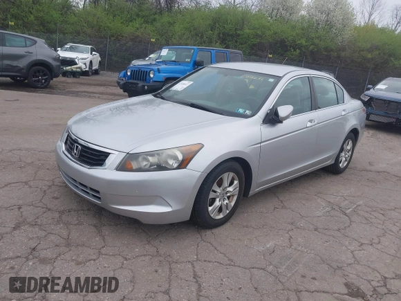 2009 Honda Accord LX-P with VIN 1HGCP26449A082631, listed as a IAAI auction lot 41938447 with 197,184 mi miles and . Bid and sale history available at DreamBid. Image 2.