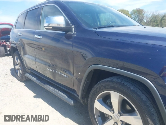 2015 Jeep Grand Cherokee Limited with VIN 1C4RJEBG5FC635136, listed as a IAAI auction lot 41894763 with 229,907 mi miles. Bid and sale history available at carsss.com. Image 6.