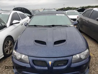 2005 Pontiac GTO z VIN 6G2VX12U15L381992, wystawiony jako Copart lot #74657644 z przebiegiem 21 995 mil mil oraz Szkody całkowita. Historia ofert i sprzedaży dostępna na DreamBid. Obrazek 5.