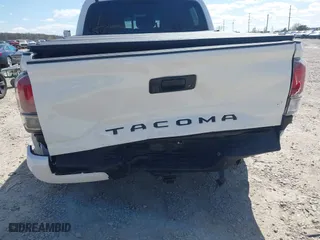 2023 Toyota Tacoma 4WD SR with VIN 3TMCZ5AN8PM647523, listed as a IAAI auction lot 41887896 with 17,864 mi miles. Bid and sale history available at carsss.com. Image 6.