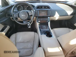 2017 Jaguar XE with VIN SAJAE4BN6HA972747, listed as a Copart auction lot 85415574 with 80,870 mi miles and Salvage Title. Bid and sale history available at DreamBid. Image 8.