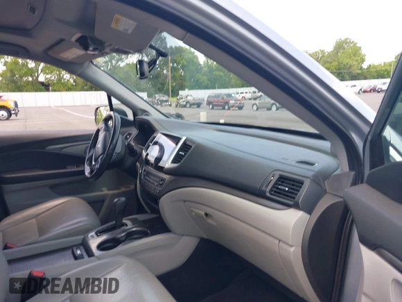2018 Honda Pilot EX-L with VIN 5FNYF5H56JB003955, listed as a IAAI auction lot 42732433 with 116,613 mi miles and . Bid and sale history available at DreamBid. Image 5.