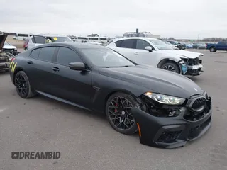 2023 BMW M8 Competition with VIN WBSGV0C03PCM74103, listed as a IAAI auction lot 40976144 with 21,035 mi miles. Bid and sale history available at carsss.com. Image 1.