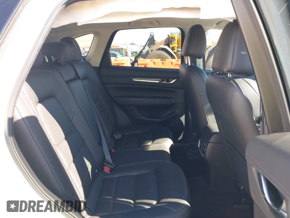 2021 Mazda CX-5 Grand Touring with VIN JM3KFBDM6M0483135, listed as a IAAI auction lot 41590430 with 33,466 mi miles. Bid and sale history available at carsss.com. Image 8.