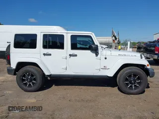 2012 Jeep Wrangler Unlimited Call of Duty MW3 с VIN 1C4BJWFG4CL130718, выставлен на аукционе IAAI как лот 42026458 с пробегом 162 884 миль миль и . История ставок и продаж доступна на DreamBid. Изображение 13.