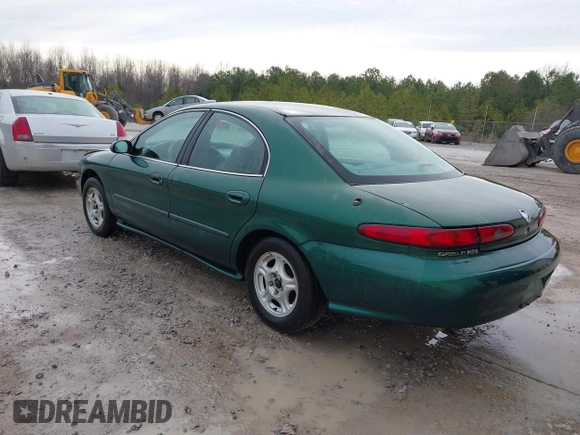 1999 Mercury Sable GS with VIN 1MEFM50U5XG633589, listed as a IAAI auction lot 41614442 with 241,833 mi miles. Bid and sale history available at carsss.com. Image 3.