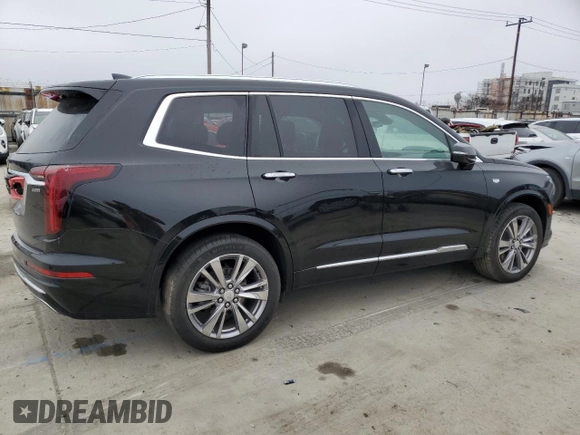 2023 Cadillac XT6 FWD Premium Luxury z VIN 1GYKPCRS5PZ119186, wystawiony jako Copart lot #50577175 z przebiegiem 32 189 mil mil oraz Szkoda całkowita • Salvage title. Historia ofert i sprzedaży dostępna na DreamBid. Obrazek 3.