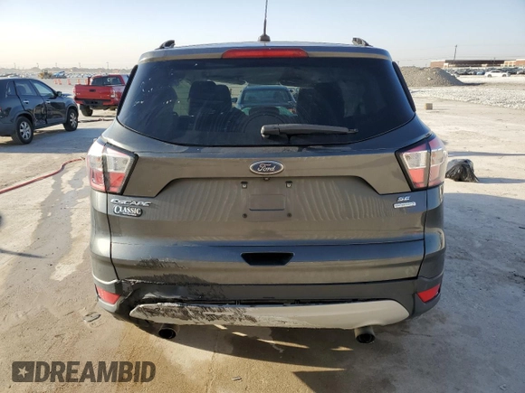 2018 Ford Escape SE with VIN 1FMCU0G95JUB49807, listed as a Copart auction lot 49744025 with 142,868 mi miles and Non Repairable. Bid and sale history available at carsss.com. Image 6.