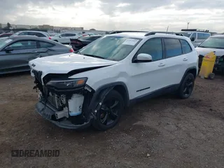 2019 Jeep Cherokee Latitude Plus with VIN 1C4PJMLB9KD453979, listed as a IAAI auction lot 41413997 with 70,664 mi miles and . Bid and sale history available at DreamBid. Image 18.