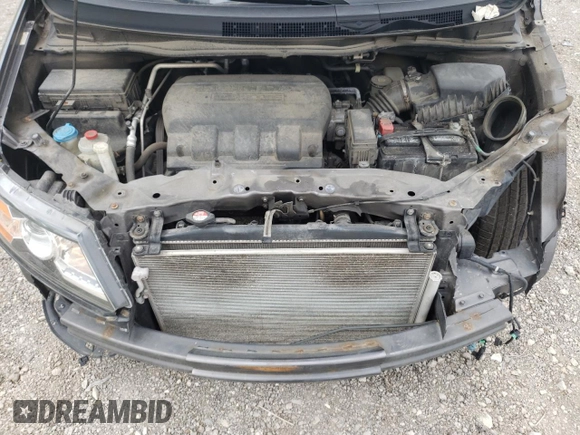 2014 Honda Odyssey Touring with VIN 5FNRL5H90EB014360, listed as a Copart auction lot 56699845 with 180,913 mi miles and Salvage title. Bid and sale history available at DreamBid. Image 12.