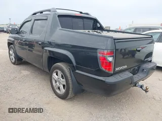 2013 Honda Ridgeline RTL with VIN 5FPYK1F56DB003473, listed as a IAAI auction lot 42101963 with 170,375 mi miles and . Bid and sale history available at DreamBid. Image 3.