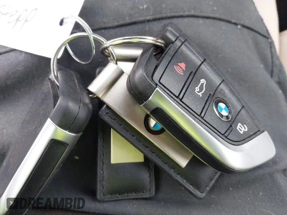 2017 BMW X1 xDrive28i with VIN WBXHT3C36H5F74818, listed as a IAAI auction lot 41853836 with 71,735 mi miles and . Bid and sale history available at DreamBid. Image 11.