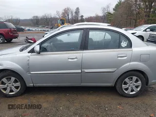 2010 Kia Rio LX with VIN KNADH4A37A6645279, listed as a IAAI auction lot 40856780 with 165,385 mi miles. Bid and sale history available at carsss.com. Image 14.