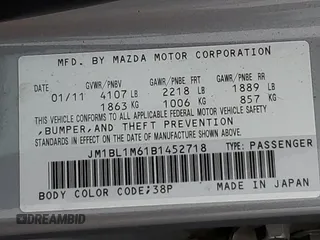 2011 Mazda 3 S Grand Touring z VIN JM1BL1M61B1452718, wystawiony jako Copart lot #50058205 z przebiegiem 160 504 mil mil oraz Szkoda całkowita • Salvage title. Historia ofert i sprzedaży dostępna na DreamBid. Obrazek 12.