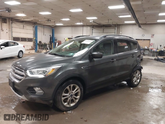 2017 Ford Escape SE with VIN 1FMCU9G9XHUB71008, listed as a IAAI auction lot 40909330 with 181,480 mi miles. Bid and sale history available at carsss.com. Image 2.