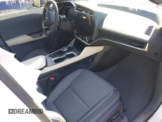 2024 Lexus RZ 300e Premium z VIN JTJABABB3RA002882, wystawiony jako IAAI lot #41262906 z przebiegiem 8 114 mil mil oraz . Historia ofert i sprzedaży dostępna na DreamBid. Obrazek 5.