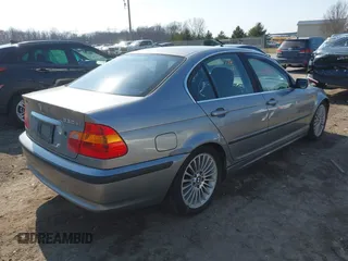 2003 BMW 3 Series 330xi with VIN WBAEW534X3PN31070, listed as a IAAI auction lot 41776406 with 176,383 mi miles. Bid and sale history available at carsss.com. Image 4.