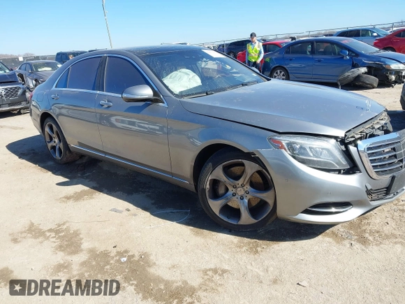 2015 Mercedes-Benz S-Class S 550 with VIN WDDUG8CB7FA072704, listed as a IAAI auction lot 41473437 with 1 mi miles. Bid and sale history available at carsss.com. Image 1.