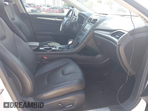 2013 Ford Fusion Titanium with VIN 3FA6P0SU0DR239890, listed as a IAAI auction lot 42745530 with 129,458 mi miles and . Bid and sale history available at DreamBid. Image 5.