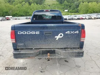 2002 Dodge Dakota z VIN 1B7GG32X32S546515, wystawiony jako Copart lot #57888695 z przebiegiem 81 202 mil mil oraz Szkoda całkowita • Salvage title. Historia ofert i sprzedaży dostępna na DreamBid. Obrazek 6.