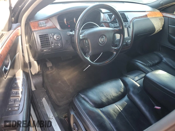 2006 Cadillac DTS Professional z VIN 1GEEH96Y26U550387, wystawiony jako Copart lot #47643785 z przebiegiem 225 562 mil mil oraz Tytuł czysty. Historia ofert i sprzedaży dostępna na DreamBid. Obrazek 8.