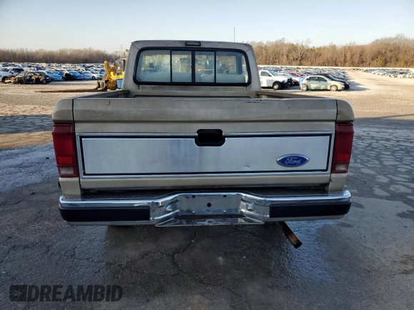 1989 Ford Ranger XL with VIN 1FTCR10AXKUC35082, listed as a Copart auction lot 42209825 with 754,095 mi miles and Salvage title. Bid and sale history available at DreamBid. Image 6.