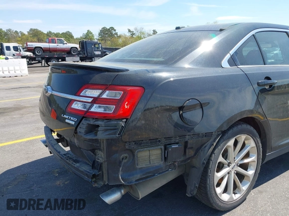 2015 Ford Taurus Limited with VIN 1FAHP2J81FG134973, listed as a IAAI auction lot 41845384 with 139,203 mi miles. Bid and sale history available at carsss.com. Image 17.