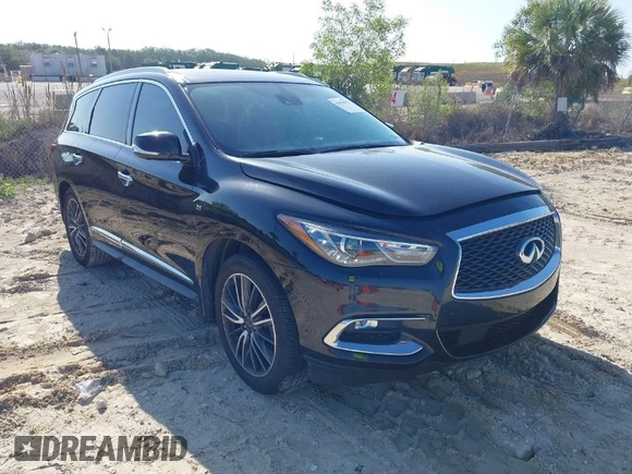 2020 Infiniti QX60 Pure with VIN 5N1DL0MN4LC539573, listed as a IAAI auction lot 42010032 with 104,507 mi miles and . Bid and sale history available at DreamBid. Image 1.