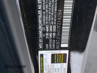 2007 Mercedes-Benz CLK 550 z VIN WDBTJ72H77F214284, wystawiony jako Copart lot #57358865 z przebiegiem 57 319 mil mil oraz Szkody całkowita. Historia ofert i sprzedaży dostępna na DreamBid. Obrazek 13.