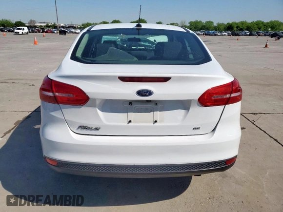 2018 Ford Focus SE z VIN 1FADP3F29JL225126, wystawiony jako Copart lot #52817265 z przebiegiem Nie podano mil oraz Szkoda całkowita • Salvage title. Historia ofert i sprzedaży dostępna na DreamBid. Obrazek 6.
