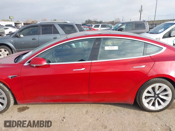 2018 Tesla Model 3 Long Range Battery with VIN 5YJ3E1EA8JF047298, listed as a IAAI auction lot 41403507 with 172,142 mi miles and . Bid and sale history available at DreamBid. Image 14.