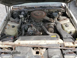 1987 Chevrolet Camaro z VIN 1G1FP21H6HL111063, wystawiony jako Copart lot #59387995 z przebiegiem 63 289 mil mil oraz Czysty tytuł • Clean title. Historia ofert i sprzedaży dostępna na DreamBid. Obrazek 11.