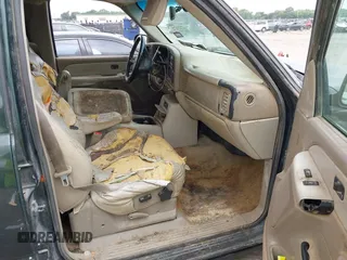 2002 GMC Yukon SLT z VIN 1GKEC13Z62R233154, wystawiony jako IAAI lot #42229172 z przebiegiem Nie podano mil oraz . Historia ofert i sprzedaży dostępna na DreamBid. Obrazek 5.