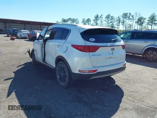 2018 Kia Sportage EX with VIN KNDPN3ACXJ7470734, listed as a IAAI auction lot 41859915 with 123,918 mi miles and . Bid and sale history available at DreamBid. Image 3.